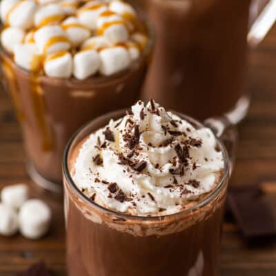 3 different types of hot chocolate on a table.