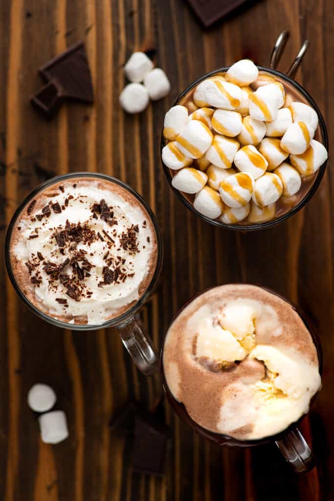 Overhead photo of three different types of hot chocolate.