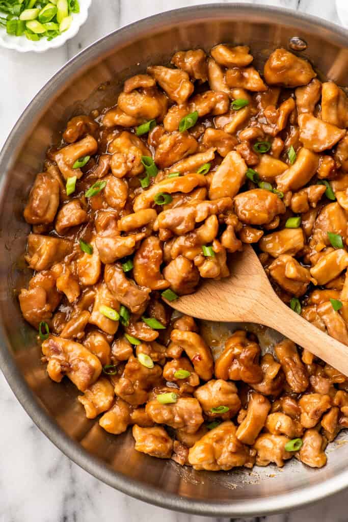 Honey ginger chicken in a skillet.