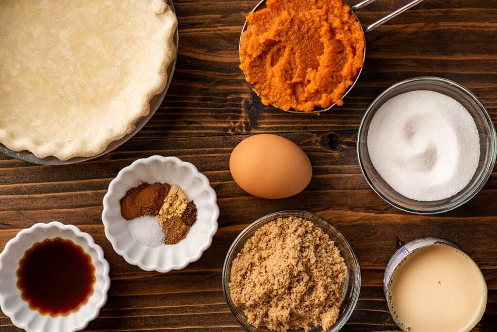 Small pumpkin pie ingredients on a table.