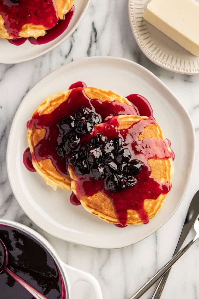 Blueberry syrup on pancakes.