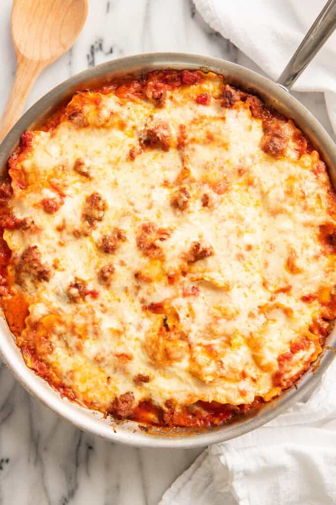 Baked ravioli in a pan.