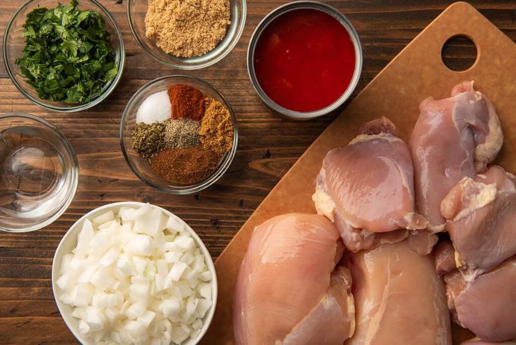Ingredients for shredded chicken tacos in the slow cooker